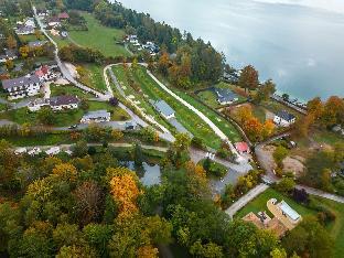 Luxury hotel room with balcony near Worthersee
